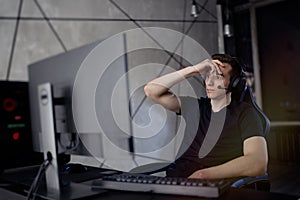 Gamer playing online video games on computer and feel depressed