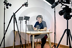 Gamer, streamer, or Youtuber streaming and recording in his studio photo