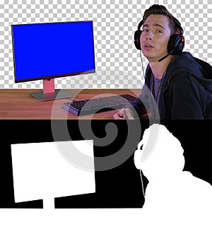 Gamer Talking to Camera Sitting Next to PC Monitor, Alpha Channe