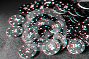 Gaming chips for gambling card games and poker on the background of a green table