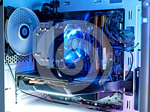 Gaming computer with RGB LED light. Components of the computer. PC case with backlight