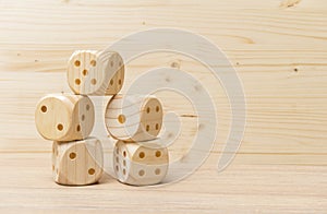 Gaming dice with copy space on wooden background. Concept for games, game board, presentation, banners or web. Top view. Close-up