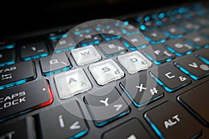 The gaming keyboard shines with multi-colored keys ,asdf button in center