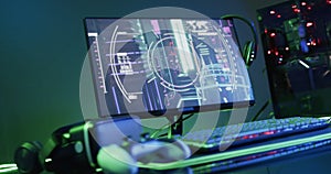 A gaming setup with vibrant screen graphics, featuring peripherals