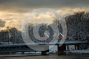 Gamle Bybro - old town`s bridge above Nidelva river. Wintertime in Trondheim.