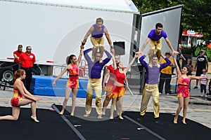 Gamma Phi Circus acrobats at Sweetcorn and Blues Festival