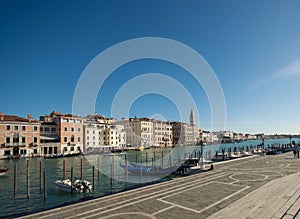 Gandola waiting for a rider at venice bay in italy