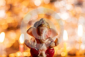 Ganesh Idol front view with beautiful bokeh- Ganesh Chaturthi and deepawali concept