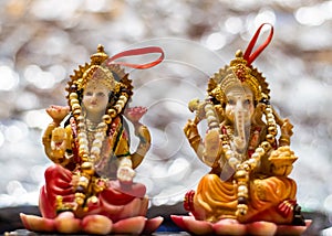 Ganesha and luxmi idols in Deepawali concept with bokeh background