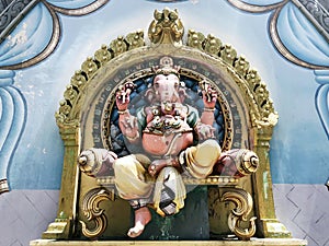 Ganesha sculpture on the wall of an Indian temple