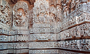 Ganesha, Shiva, Vishnu lords on relief of great Indian temple. Architecture of ancient temples with carved walls