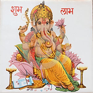 Ganesha sitting on lotus flower, India photo