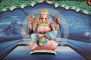 Ganesha sitting on lotus flower, India