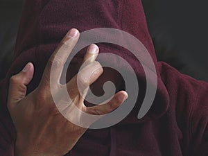 Gang member with a hand sign photo