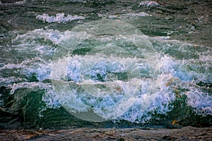 Ganga river in turbulent flow. High speed Ganga river flow in Haridwar India