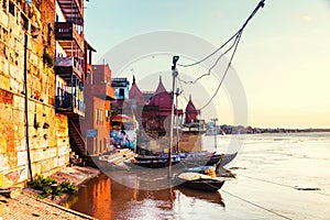 Ganges river aerial view in Varanasi, India. Ghats with boats in the morning