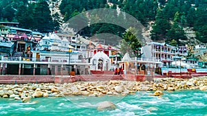 Gangotri Temple on the banks of Ganga river in Uttarakhand, India photo