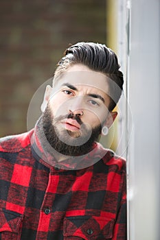 Gangster with beard and piercings