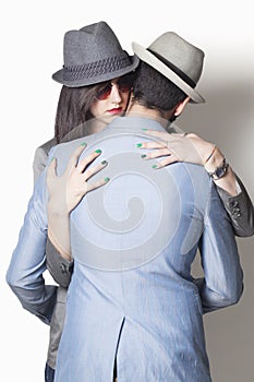 Gangster couple hugging