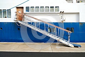 gangway entry on a big ship in a commercial harbour