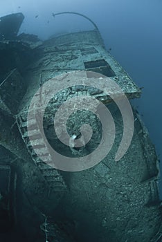 Gangway and ladder on the side of a shipwreck. photo