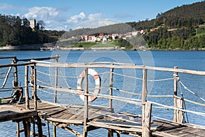 Gangway over the water and a lifebuoy