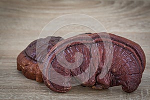 Ganoderma Lucidum Mushroom on wood background