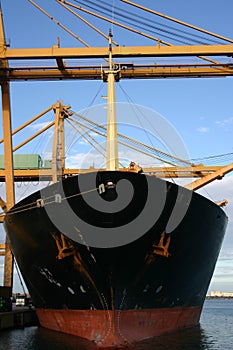 Gantry cranes loading containers , Valence, Spain photo