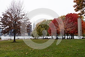 Gantry Plaza State Park in Long Island City Queens with Colorful Trees during Autumn with a Manhattan Skyline View