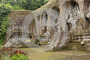 Ganung Kawi Temple complex centered around Royal Tombs carved into stone cliffs in the 11th century. Bali, Indonesia. Funeral photo