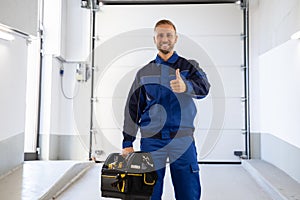 Garage Door Installation And Repair At Home. Contractor Man