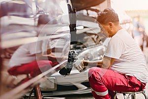 Garage Mechanic service staff working fix replace cleaning braking system