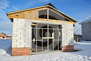 Garage under construction. Building construction new metal frame garage door