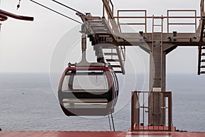 Garajau - Empty cable car going to the beach of Garajau, Canico, Madeira island, Portugal, Europe. Panoramic view