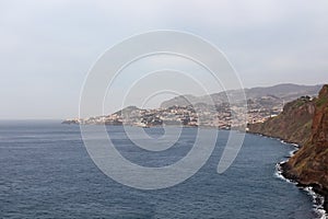 Garajau - Panoramic view city of Funchal seen from Cristo Rei in Garajau, Madeira island, Portugal, Europe. Majestic coastline