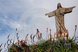 Garajau - Scenic view of majestic statue of Christ the King statue (Cristo Rei) in Garajau, Madeira island, Portugal, Europe