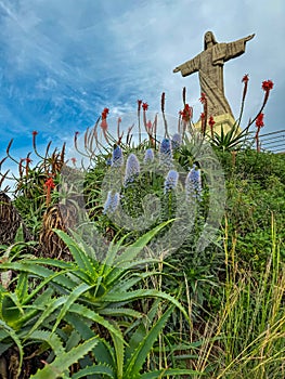 Garajau - Scenic view of majestic statue of Christ the King statue (Cristo Rei) in Garajau, Madeira island, Portugal, Europe