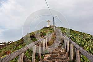 Garajau - Wooden staircase to Cristo Rei statue on hilltop of Garajau, Canico, Madeira island, Portugal, Europe