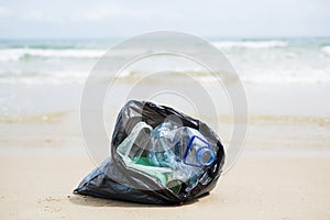 Garbage bag on the beach