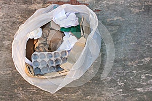Garbage bag with different paper trash. Garbage sorting