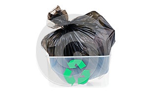 Garbage bag in a plastic bin isolated on white background