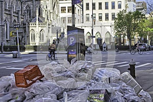 Garbage bags full of trash on the street of New York City