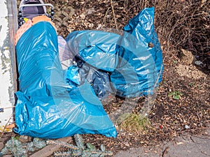 Garbage bags illegally in the forest