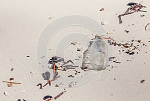 Garbage on the beach, concept of pollution environment.