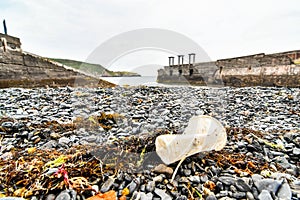 garbage on beach, photo as a background , in principado de asturias, spain europe photo