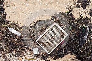 Sea pollution concept. Garbage on the beach