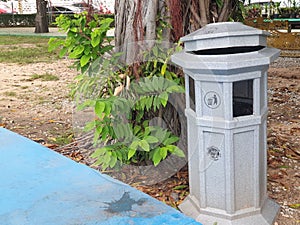 garbage bins in the park photo