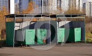 Garbage cans in park on sunny autumn day, Moscow, Russia