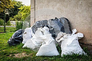 Garbage and construction debris in bags. Reconstruction and waste collection