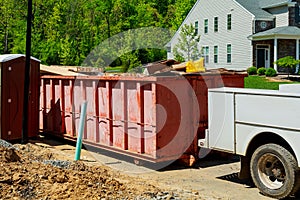 garbage containers near the new home, Red containers, recycling and waste construction site on the background